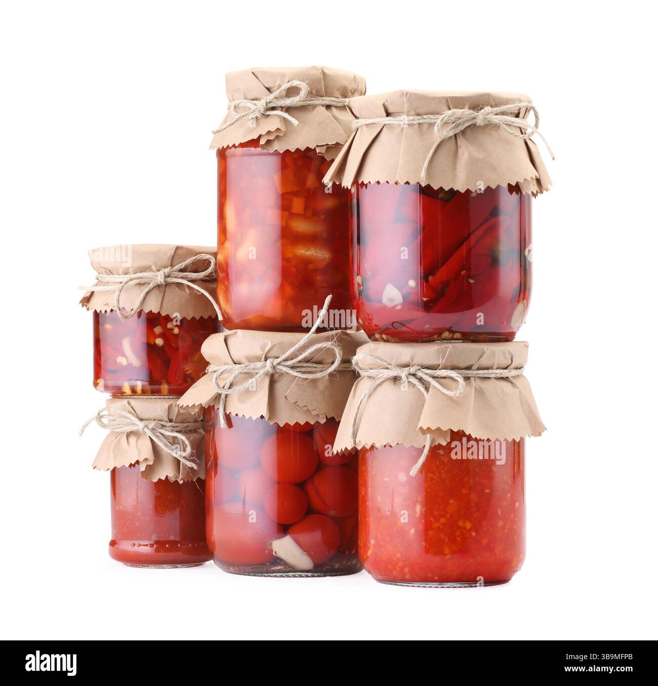 Many jars with different pickled products isolated on white Stock Photo