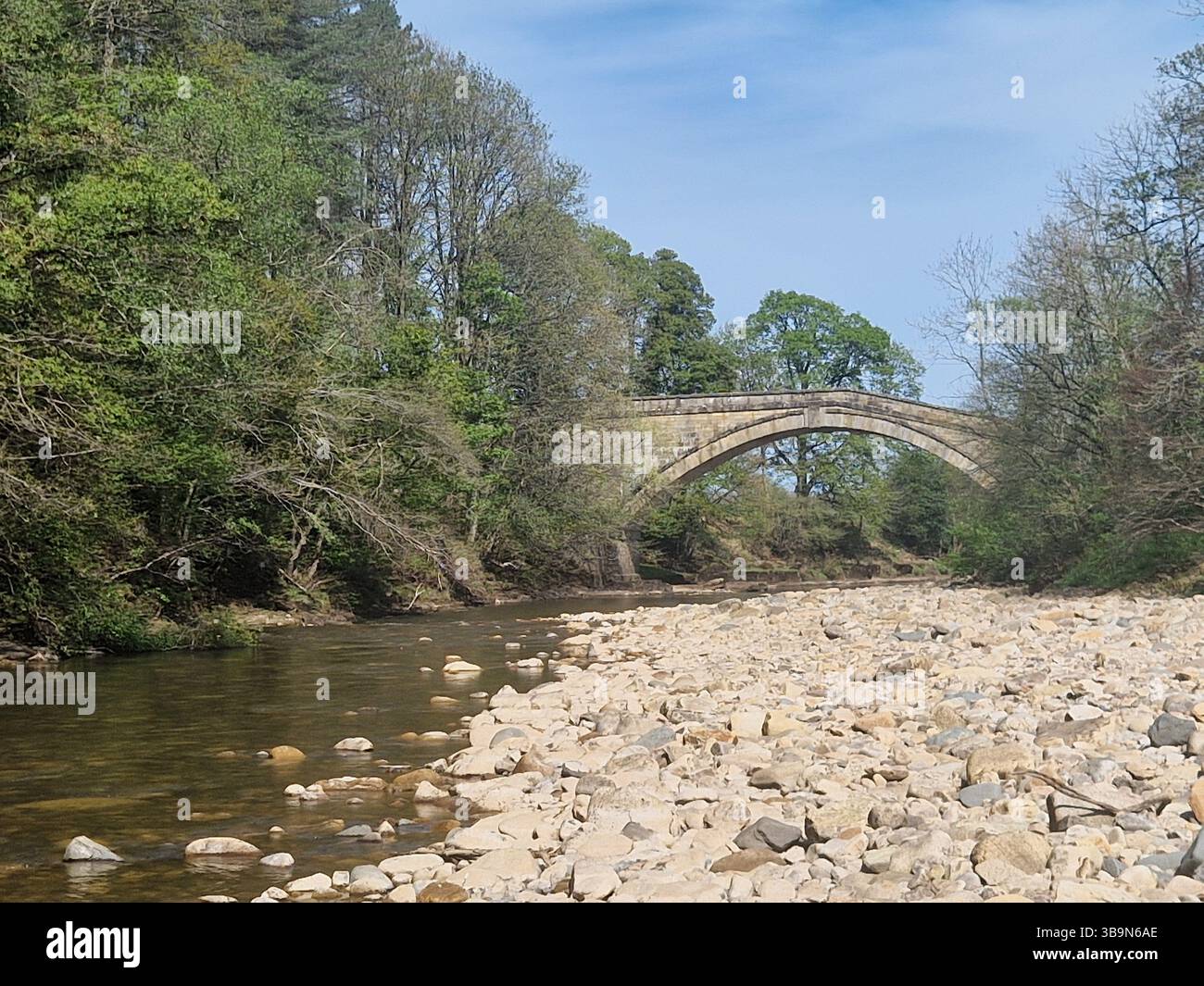 Low river level on the South Tyne, Northumberland after a very dry Spring in May  2025 - Smartphone Captured Stock Image
