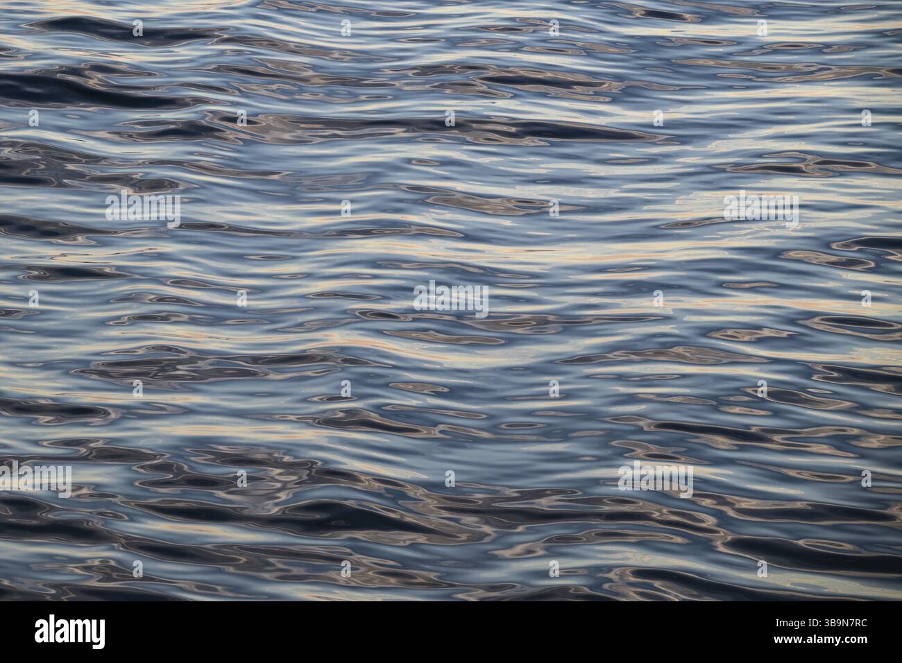Small waves, clouds reflected on the sea surface, Baltic Sea Stock Photo