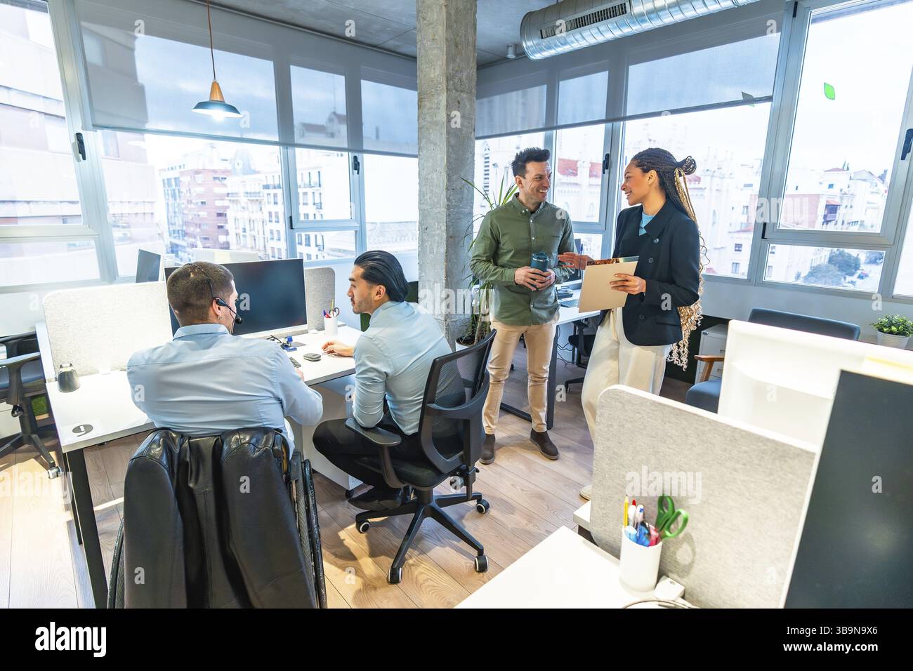 Business team collaborating on project in modern office, showcasing ...