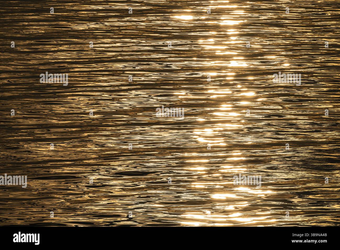 Sun rays are reflected on the sea surface, small waves, Baltic Sea Stock Photo