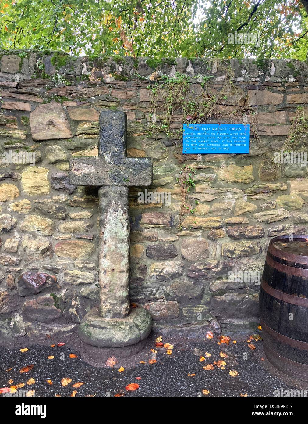 This medieval cross once stood in the market place. Its base is thought to be roman and the shaft probably 13th century. Corbridge, Northumberland - Smartphone Captured Stock Image