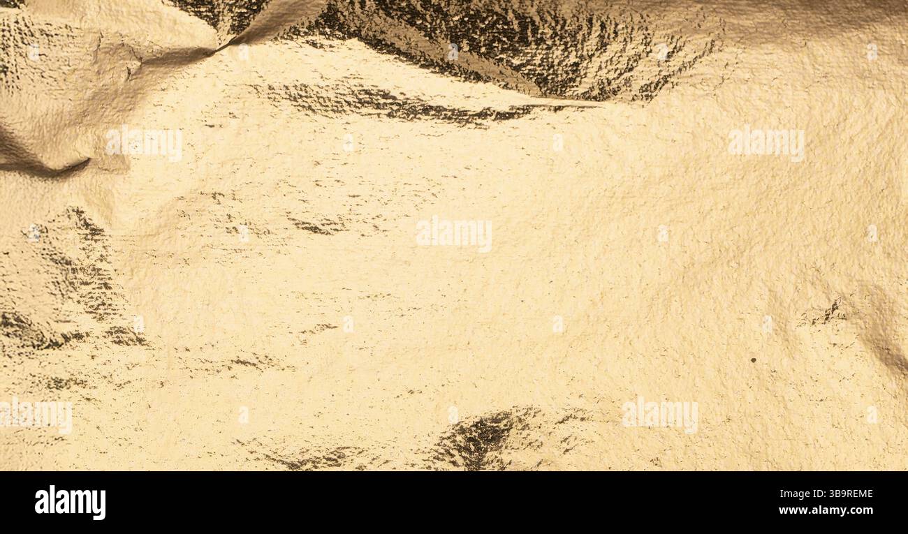 Reme Background Texture of creases in gold foil hi-res stock photography and images - Alamy