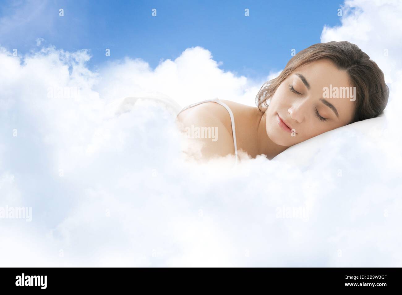 Woman sleeping on fluffy cloud in blue sky. Bedtime Stock Photo - Alamy