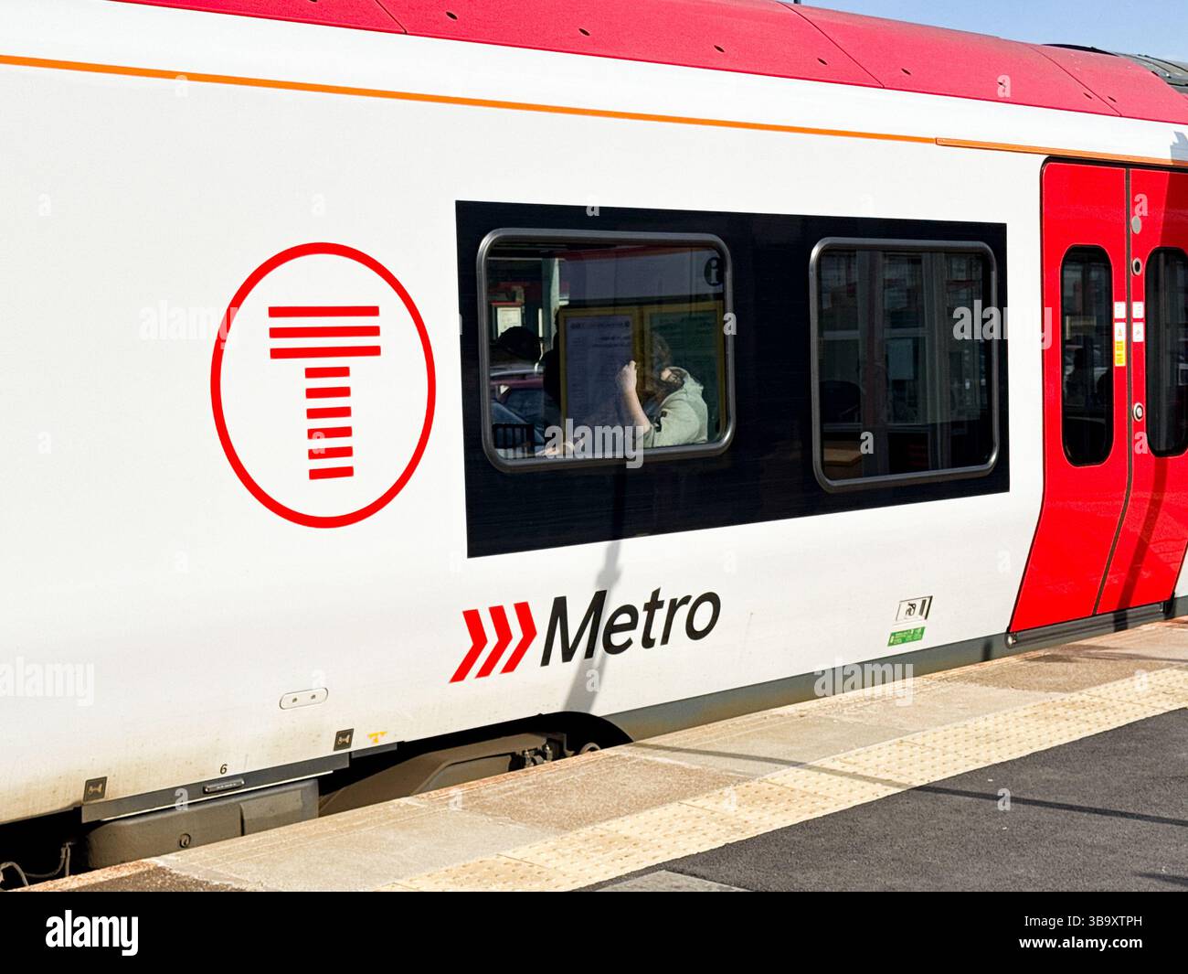 Treforest, Pontypridd, Wales, UK - 29 April 2025: Close up view of a Class 756 train operated by Transport for Wales at Treforest Railway station - Smartphone Captured Stock Image