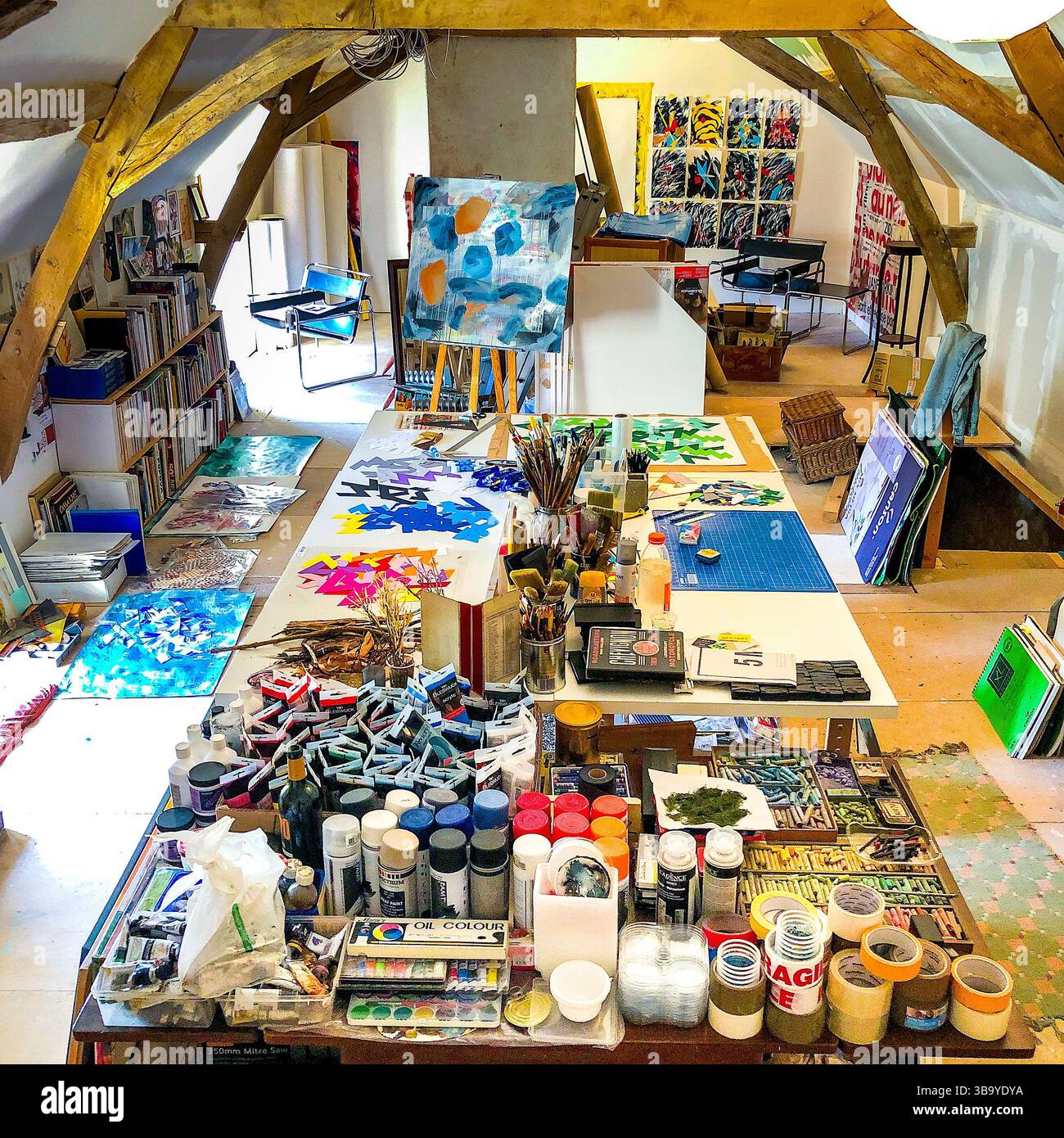 Long Image Material Overhead view of (my) art studio showing long work-table, art materials ...