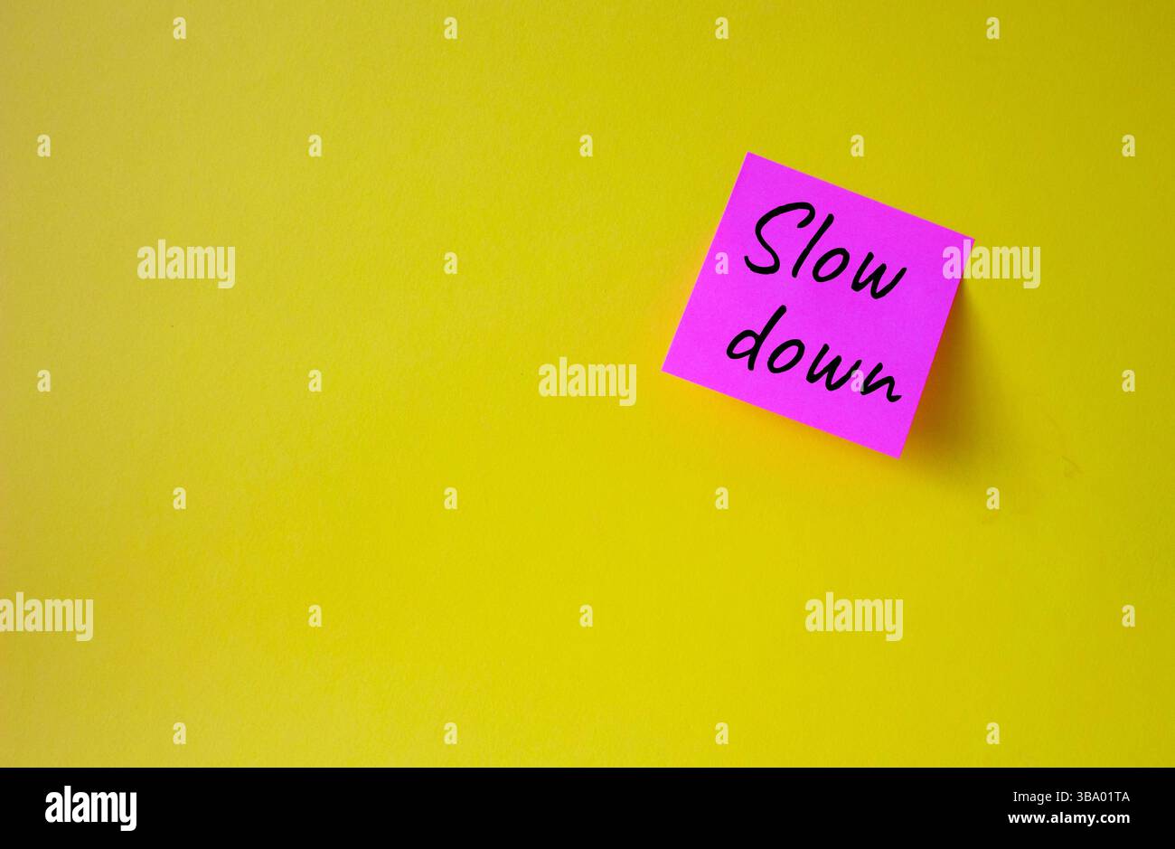 Slow down symbol. Pink steaky note with words Slow down. Beautiful ...