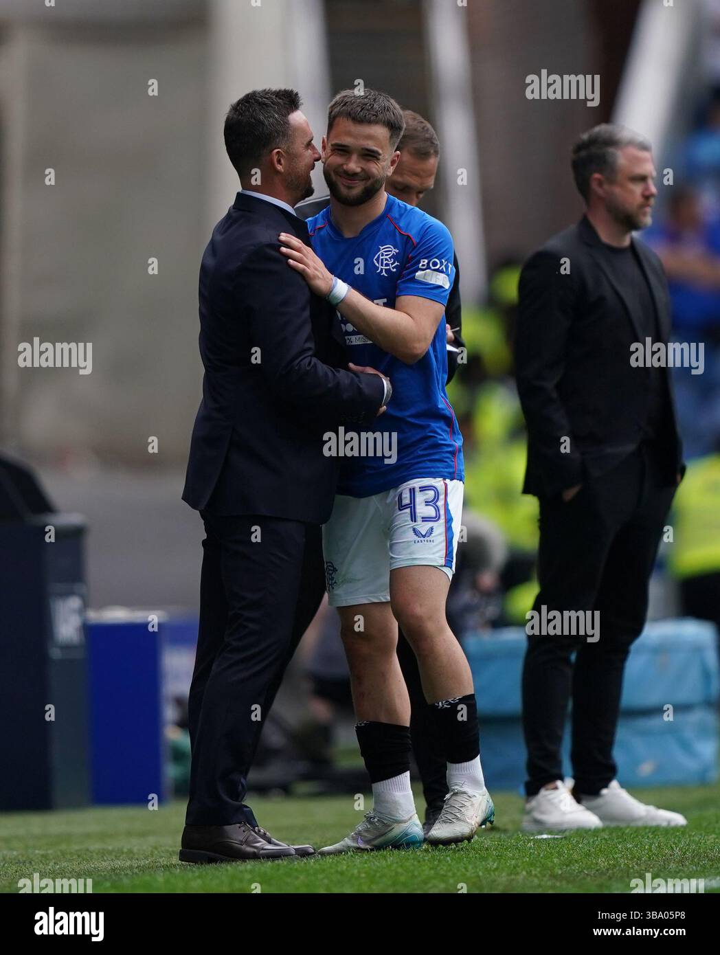 Rangers' Nicolas Raskin with interim manager Barry Ferguson as he ...