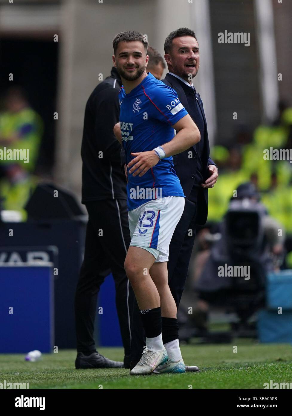 Rangers' Nicolas Raskin with interim manager Barry Ferguson as he ...