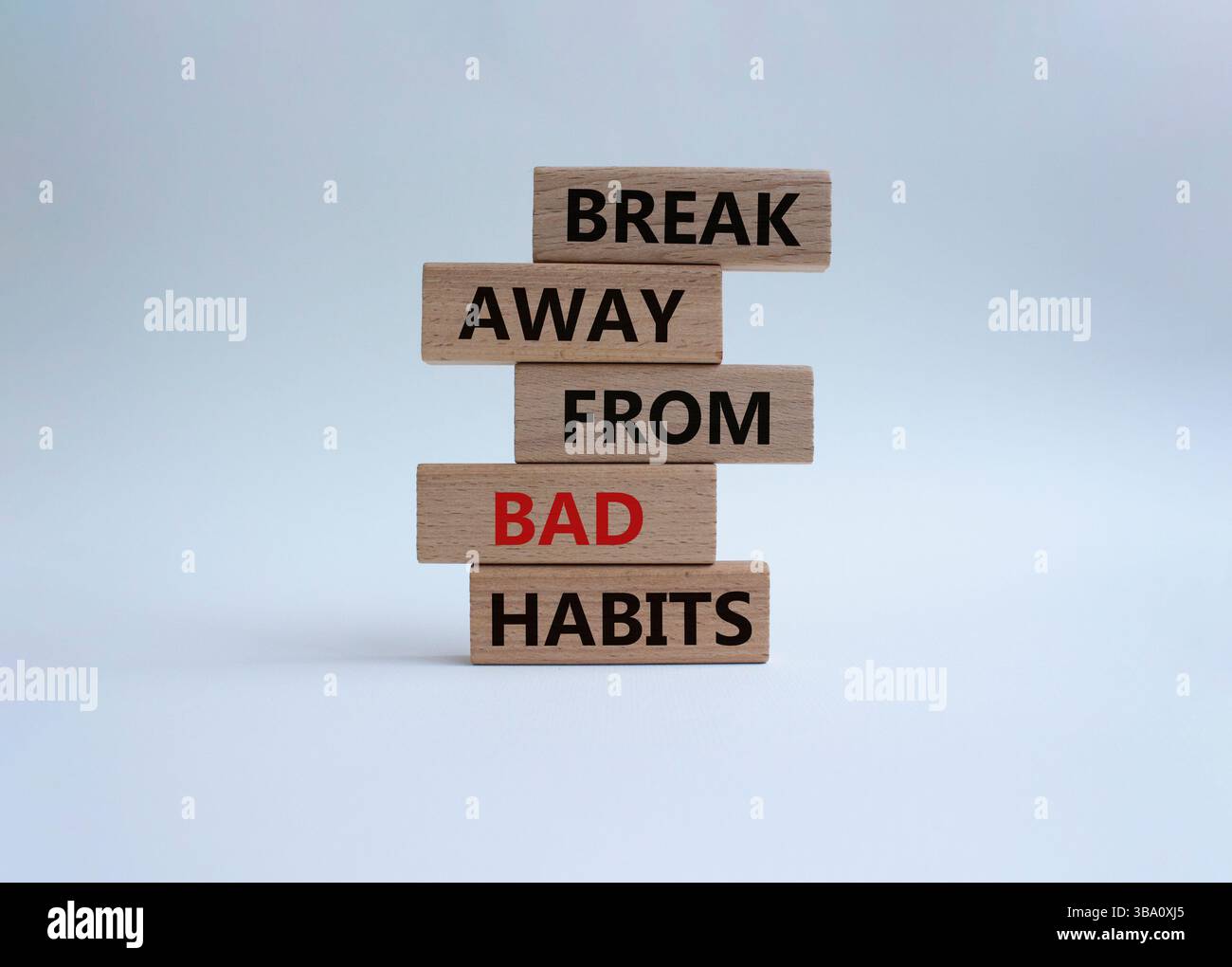 Break away from bad habits symbol. Wooden blocks with words Break away ...