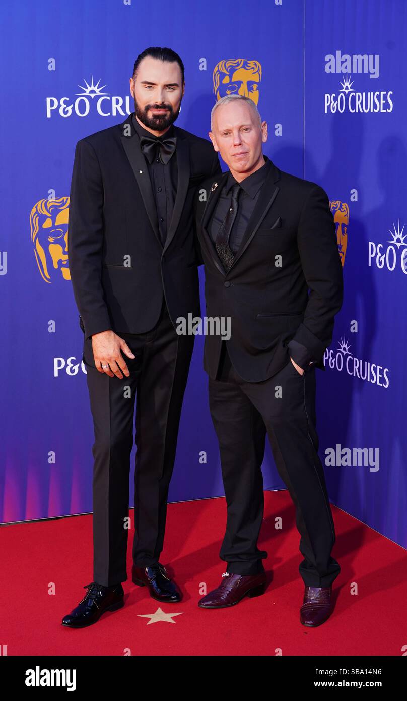Rob Rinder Feet (Left to right) Rylan Clark and Robert Rinder attending the 2025 BAFTA ...