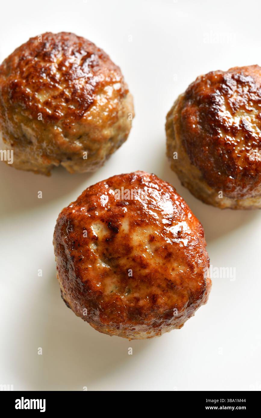 Cutlets from minced meat on white background. Close up view Stock Photo