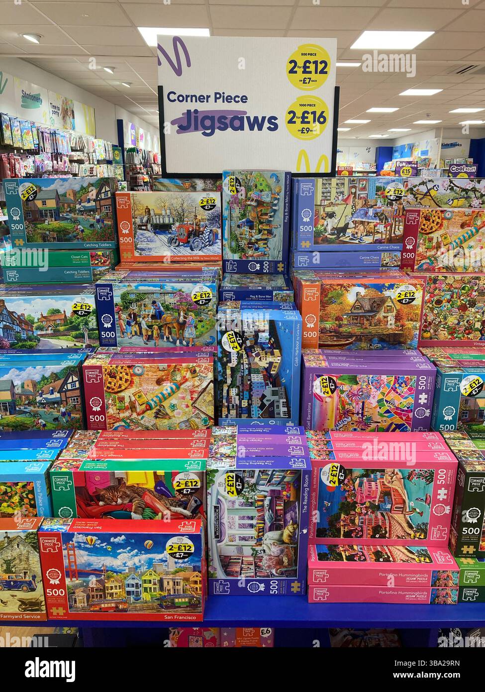 Assorted jigsaws for sale in a general stationery store, UK - Smartphone Captured Stock Image