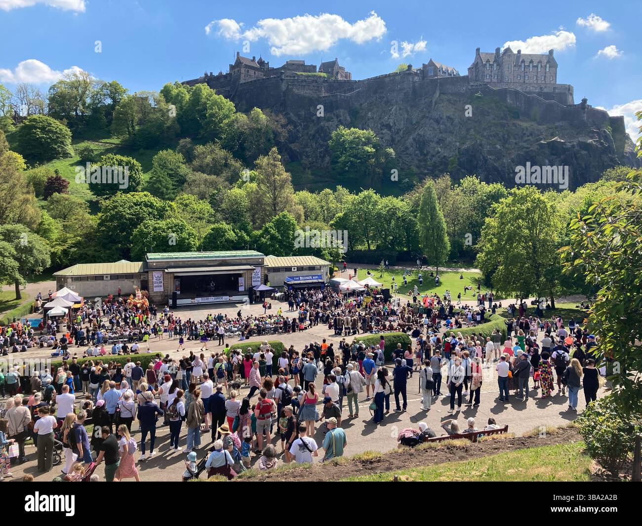 The Inaugural Tartan Parade ends in Princes Street Gardens, with entertainment and a Ceilidh at the Ross Bandstand, Edinburgh Scotland. 10th May 2025 - Smartphone Captured Stock Image