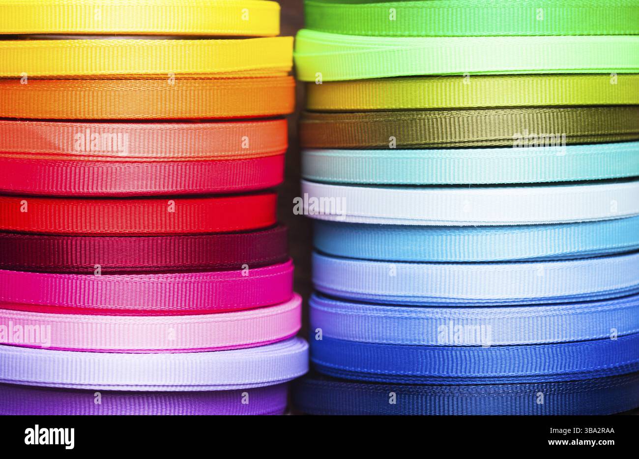 The various colors ribbon bobbins close up Stock Photo