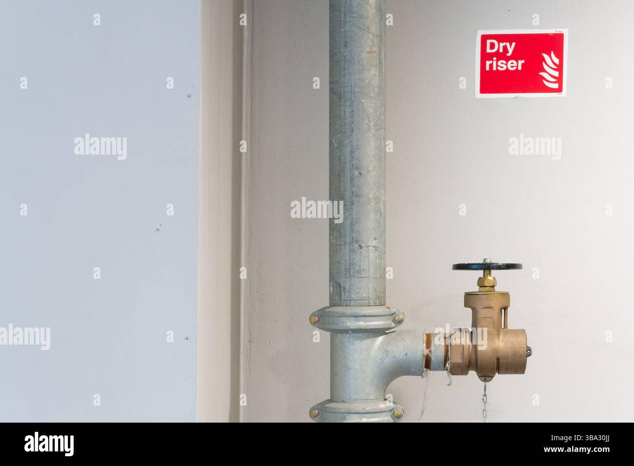 Dry riser landing valve within office building Stock Photo - Alamy
