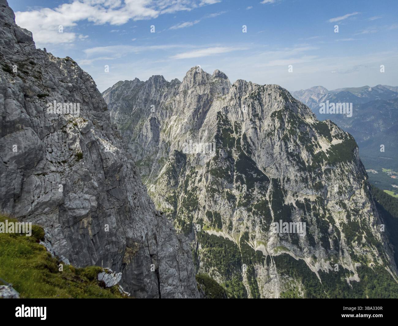 Climbing on the Alpspitze via ferrata in the Wetterstein Mountains near Garmisch Partenkirchen Stock Photo