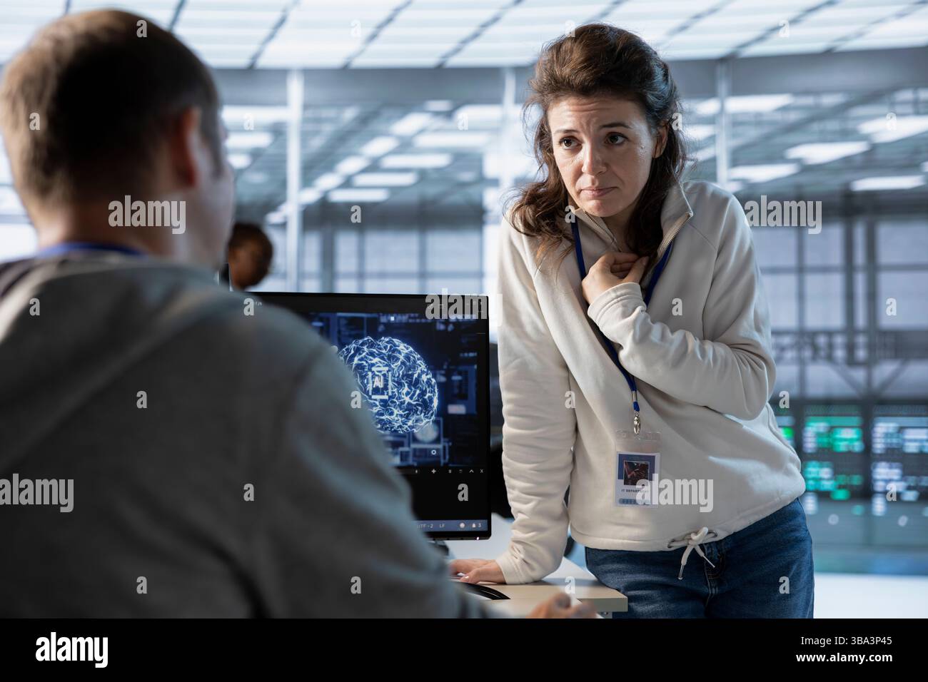 Team of engineers using machine learning to optimize data center operations, improving efficiency of infrastructure. Coworkers doing brainstorming, implementing server virtualization Stock Photo