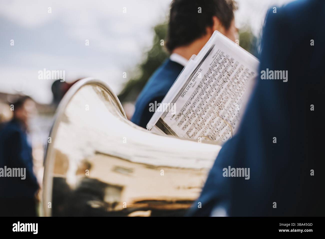 Tenor and bass tuba players perform Golden Bridge and other songs Stock Photo