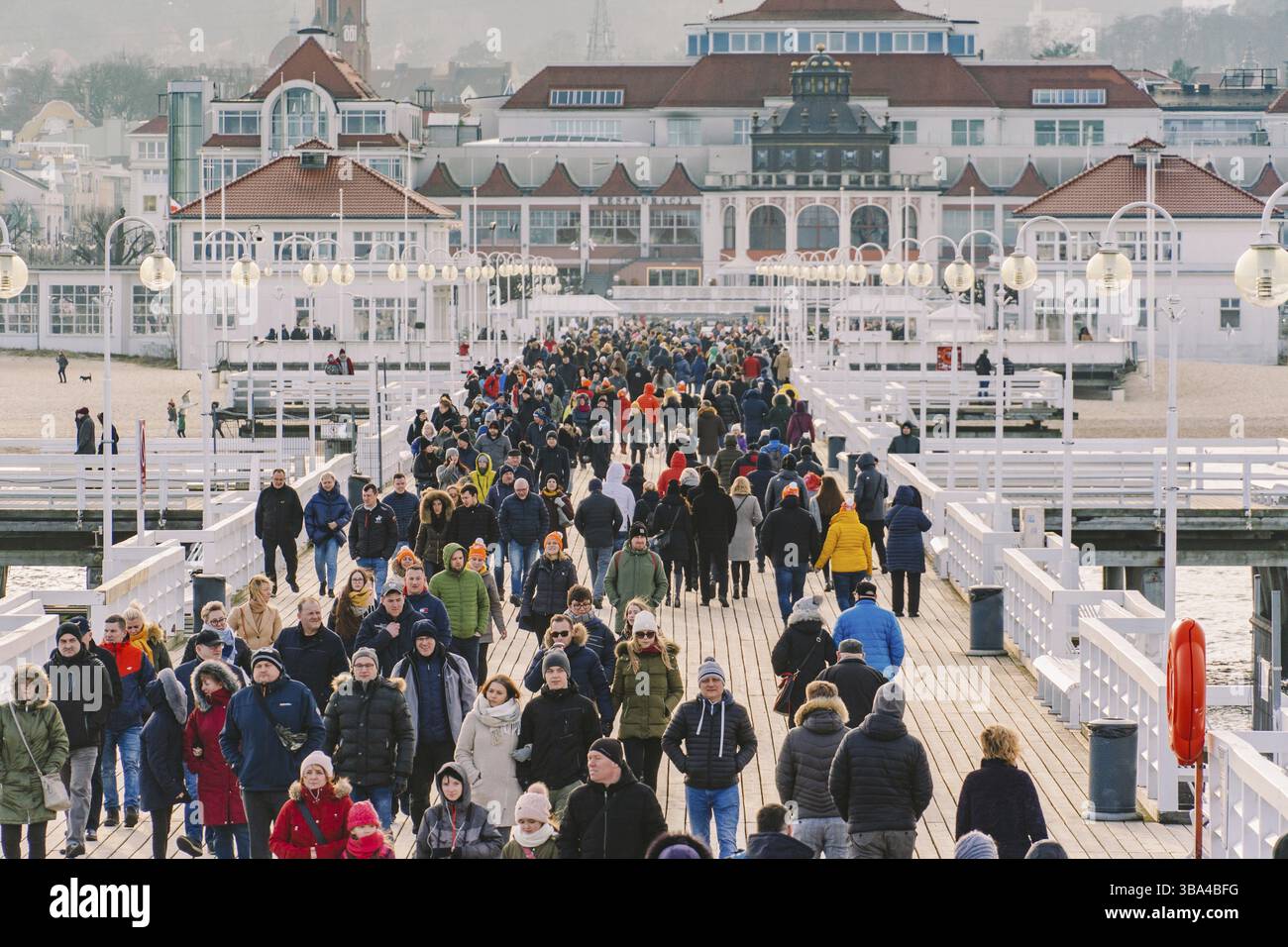 People walks on wooden pier hi-res stock photography and images - Alamy