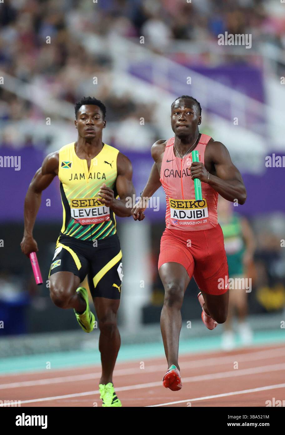 Canadian sprinter Eliezer Adjibi, right, and Bryan Levell of Jamaica ...