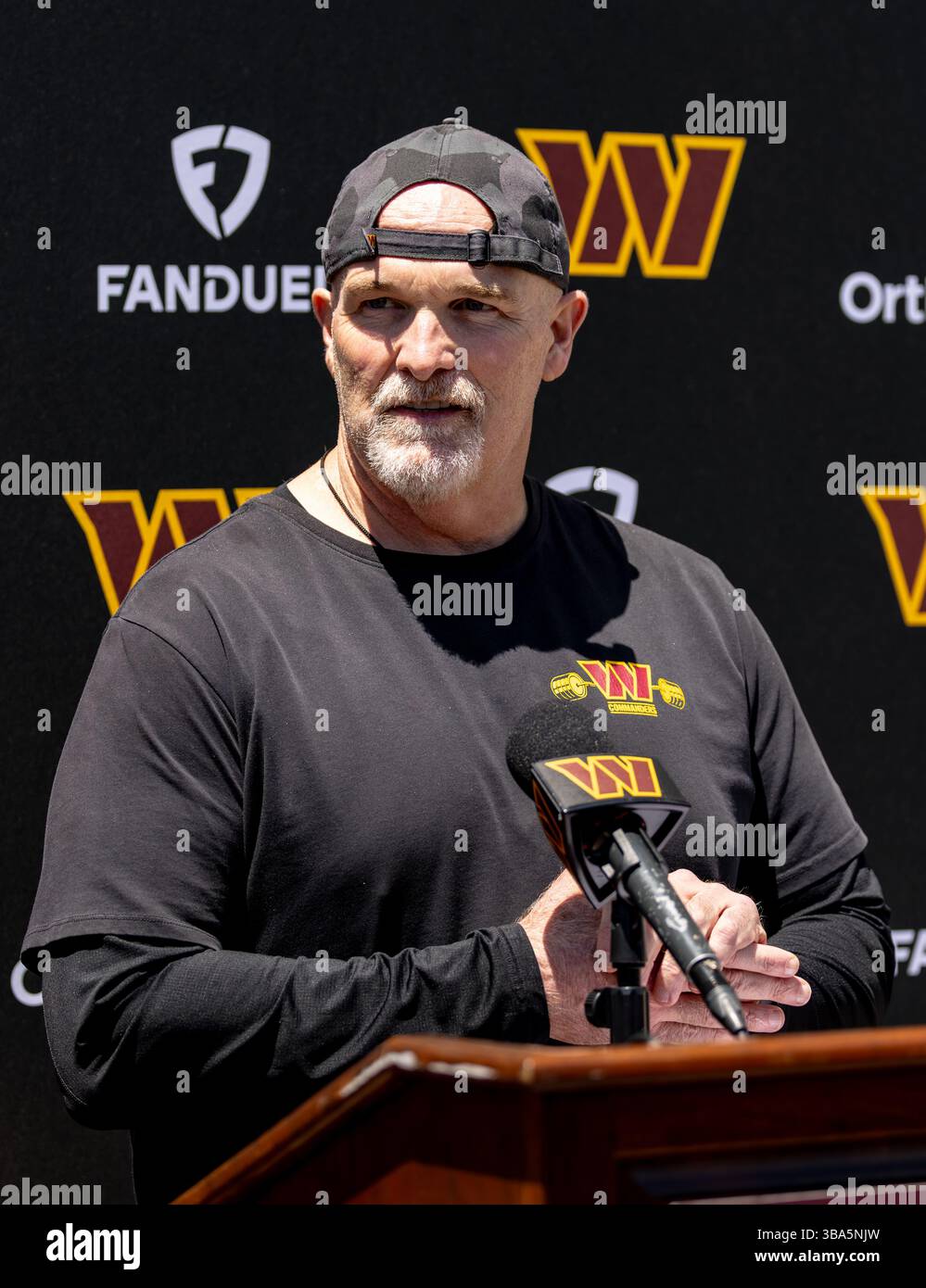 Washington Commanders head coach Dan Quinn addresses the media before ...