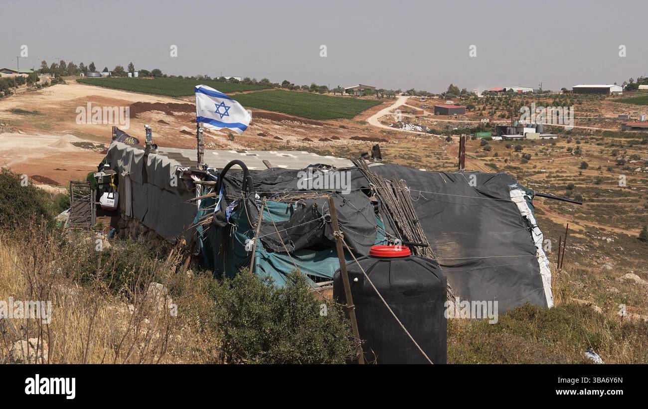 Nablus Line The Israeli flag flutters over a makeshift residence in the Israeli ...