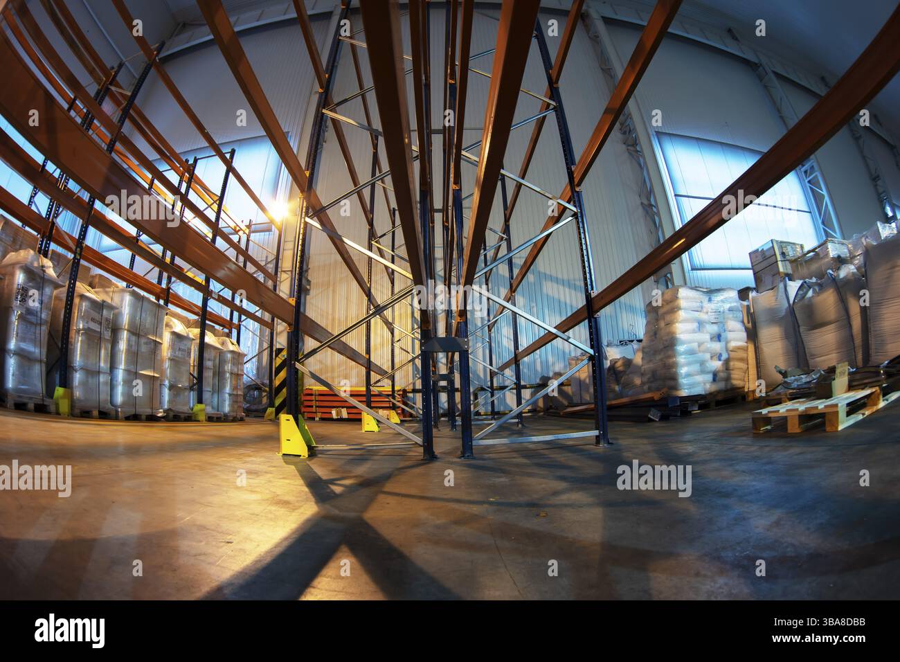 Storage rooms in a factory or workshop with metal shelving Stock Photo