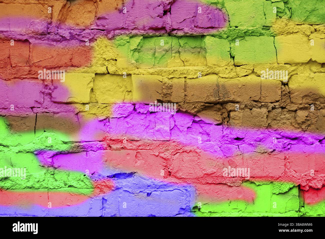 Multicoloured brick wall in close-up. Bright fun background in the style of graffiti Stock Photo