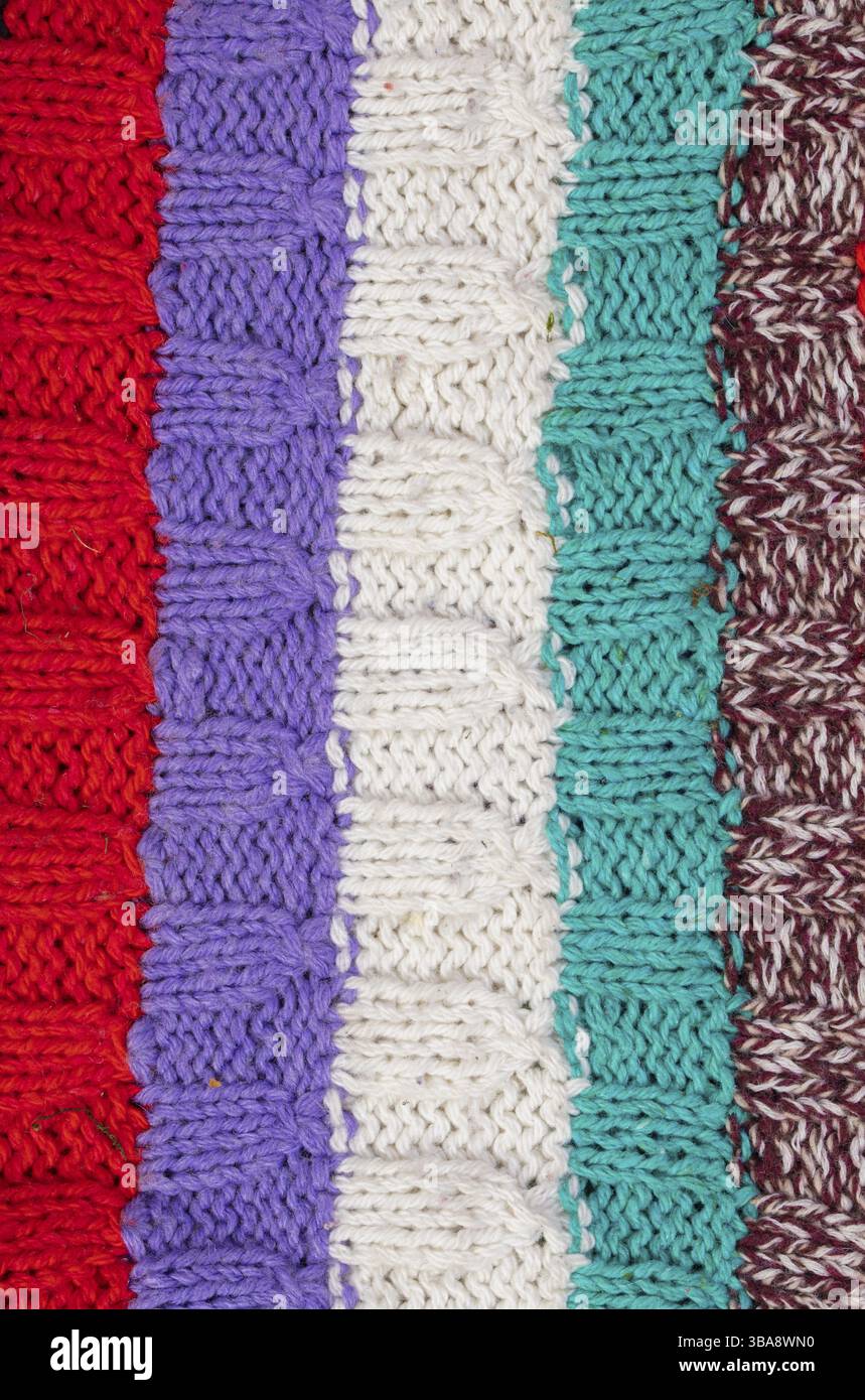 Knitted multicoloured texture. Background knitted stripes close-up Stock Photo