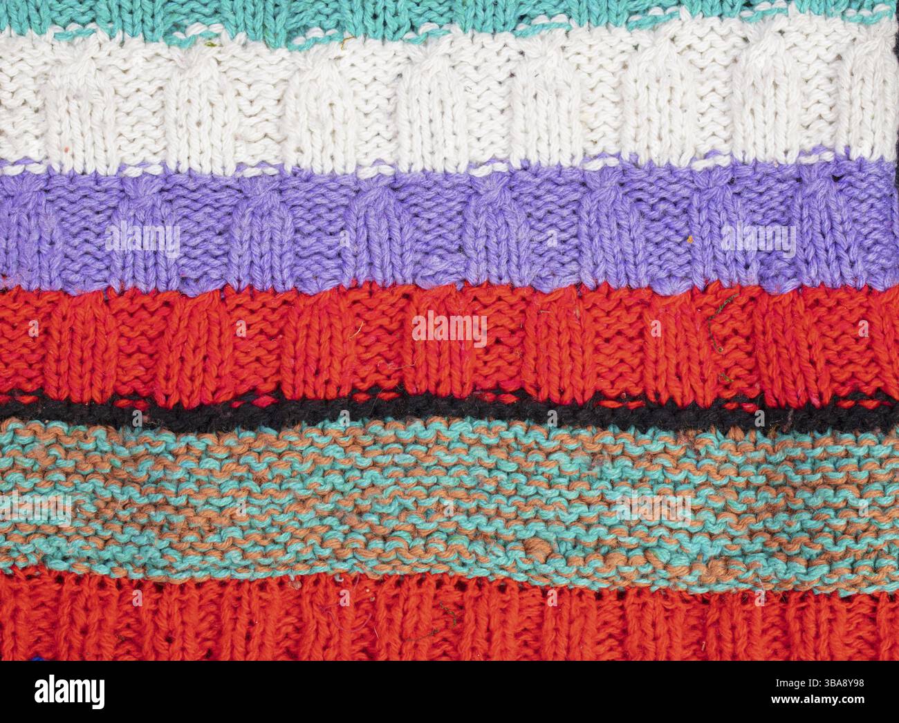 Knitted multicoloured texture. Background knitted product close-up Stock Photo