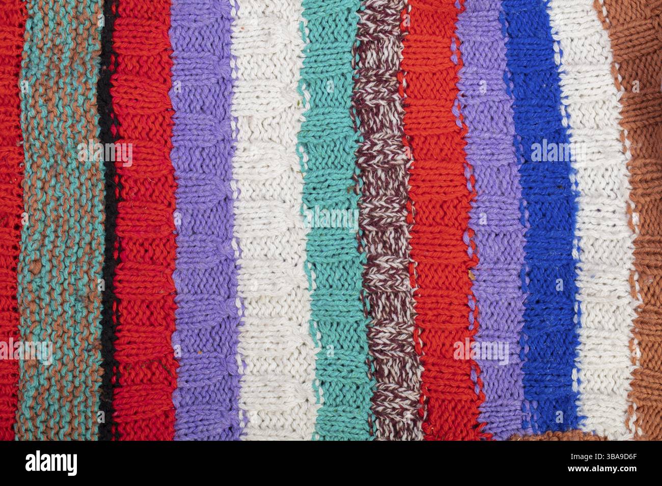 Knitted multicoloured texture. Background knitted product close-up Stock Photo