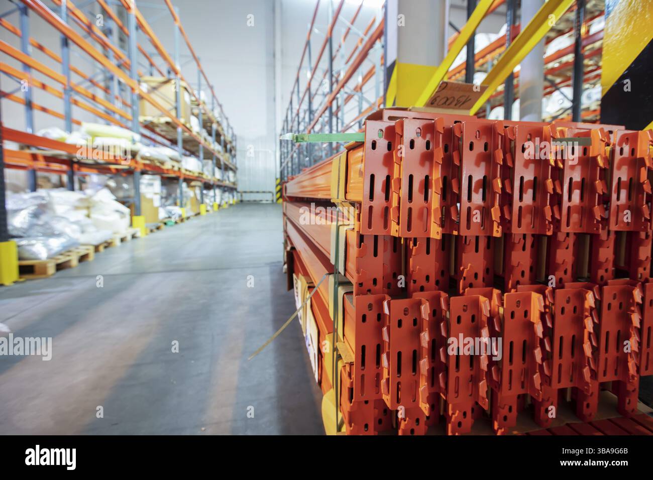Storage rooms in a factory or workshop with metal shelving Stock Photo
