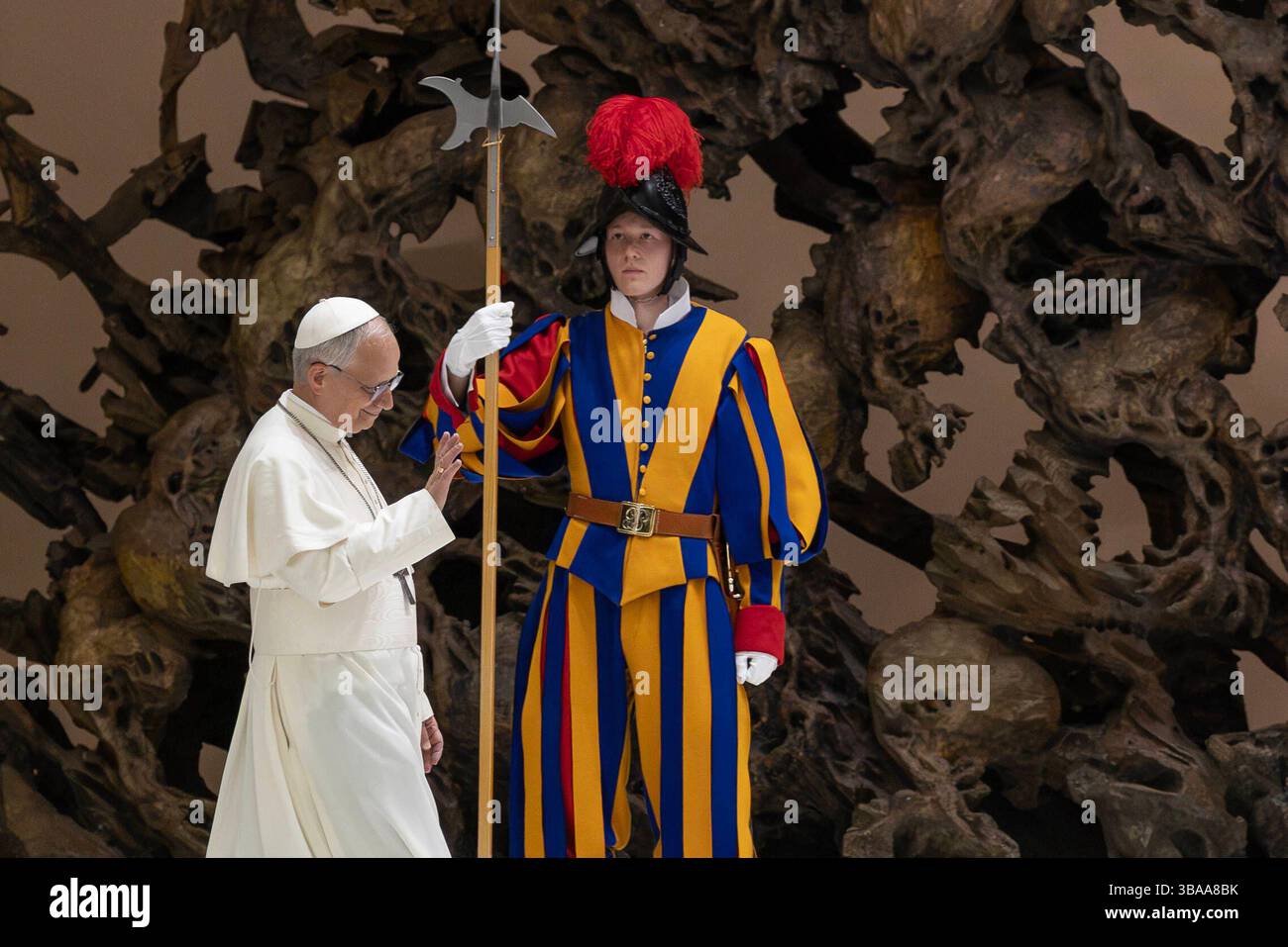New pope Leo XIV in the Vatican in Rome, Italy Newly elected Pope Leo XIV walks past a Swiss Guard as he arrives for an audience with members of the media at the Paul VI Audience Hall, in the Vatican in Rome, Italy on May 12, 2025. On 08 of May, a conclave of 133 cardinals elected Robert Francis Prevost, Leon XIV as the new 267 Pope. Rome ITALY Copyright: xMatrixxImagesx/xAndrexPainx Stock Photo