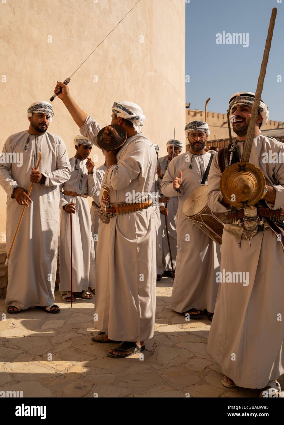 Omani soldiers perform a traditional dance ritual at Nizwa Fort