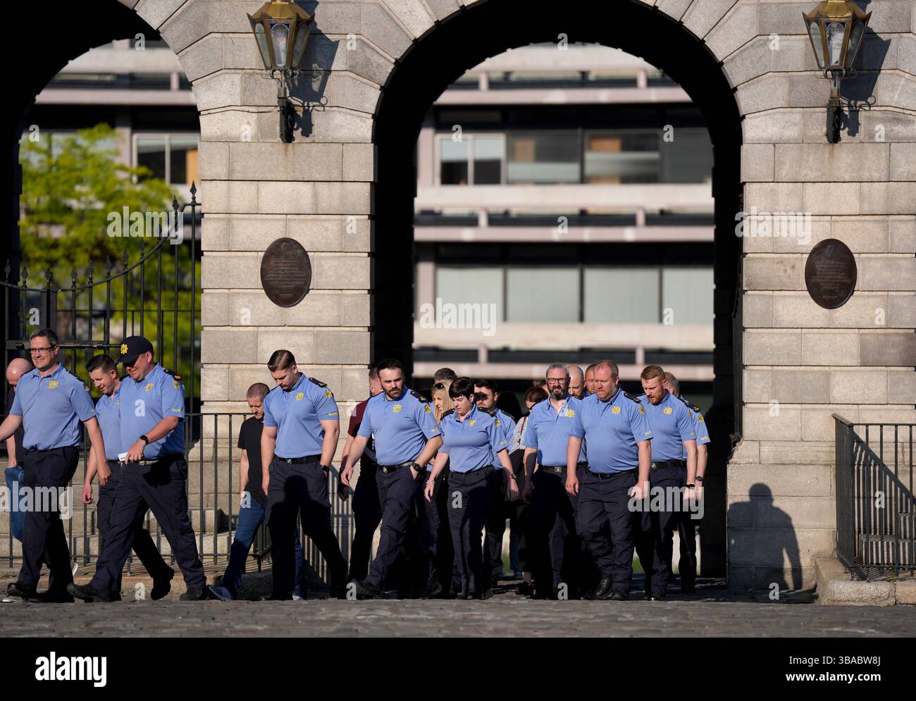Members of the Garda arrive for a memorial service at Dublin Castle ...