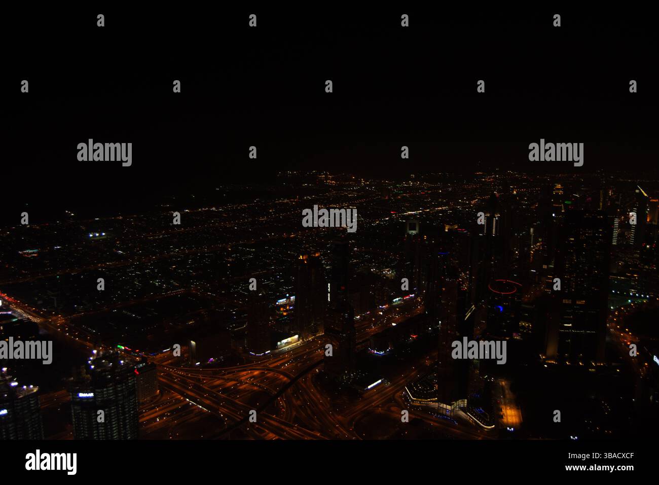 A stunning night view of a city skyline illuminated by lights ...