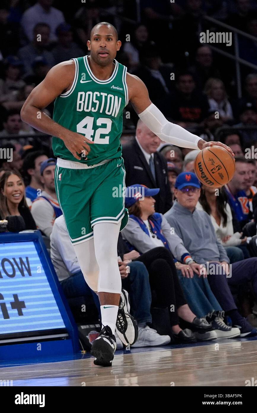 Boston Celtics' Al Horford dribbles the ball during the second half of