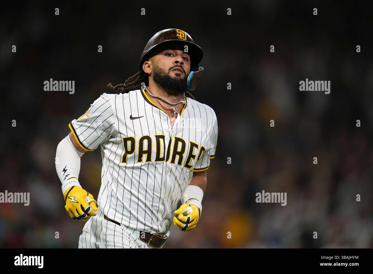San Diego Padres' Fernando Tatis Jr. celebrates after hitting a home