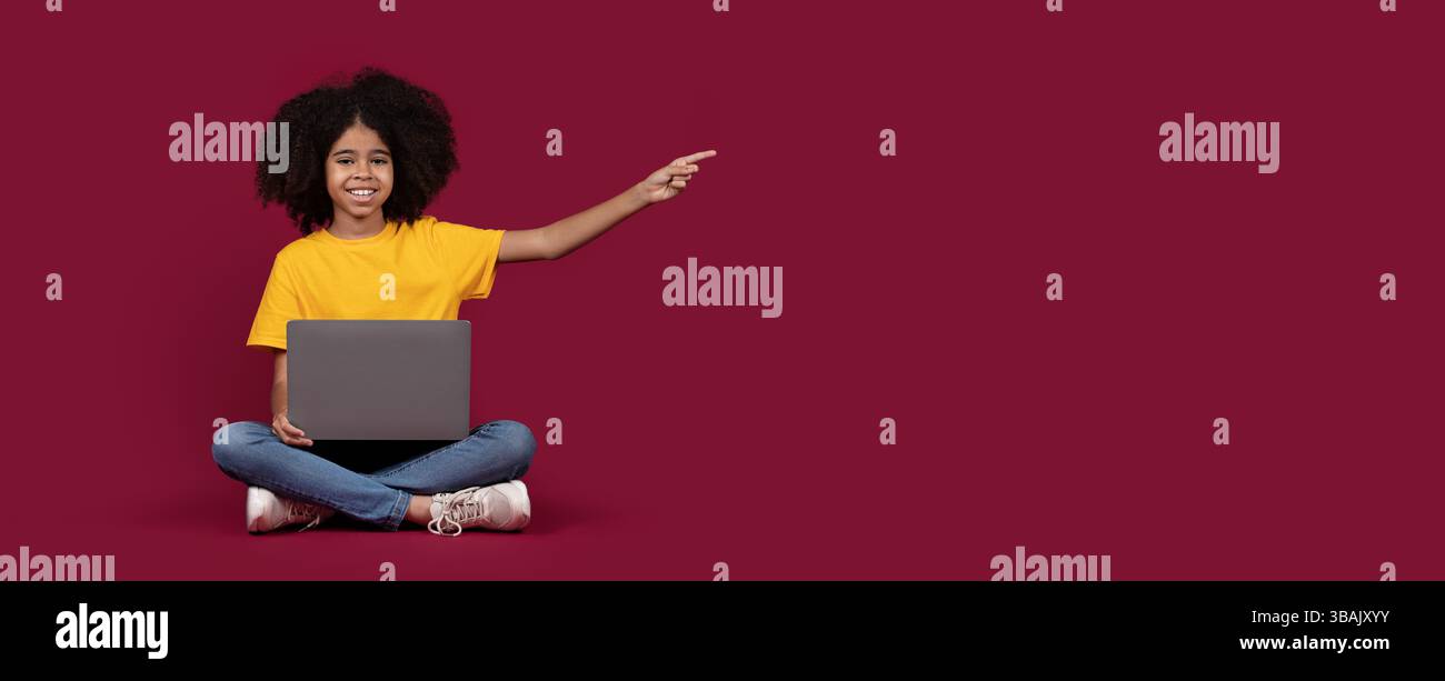 Happy african american child preteen girl sitting on floor over ...