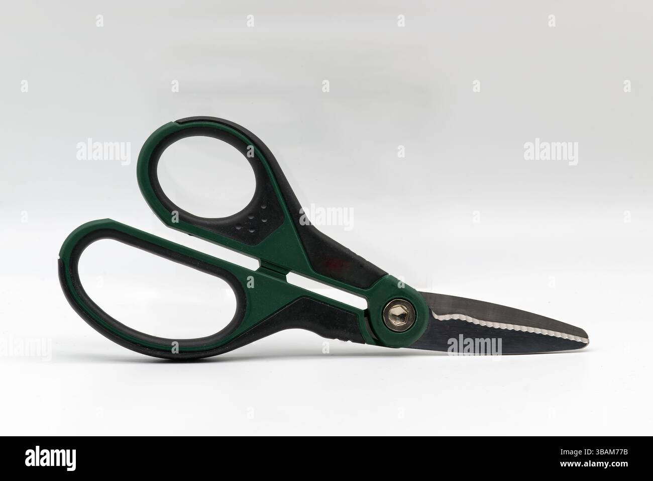 Multi purpose scissors isolated on white background. Stock Photo