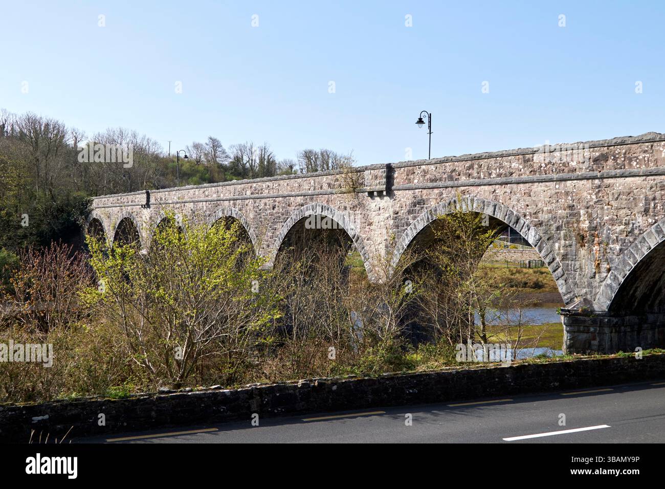 seven arches old railway bridge across the newport river newport county mayo republic of ireland Stock Photo