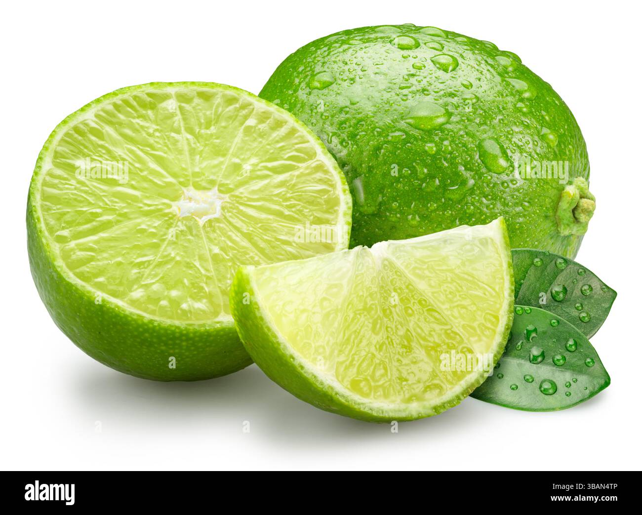 Ripe lime fruits with slices and lime leaves isolated on a white background. File contains clipping path. Stock Photo