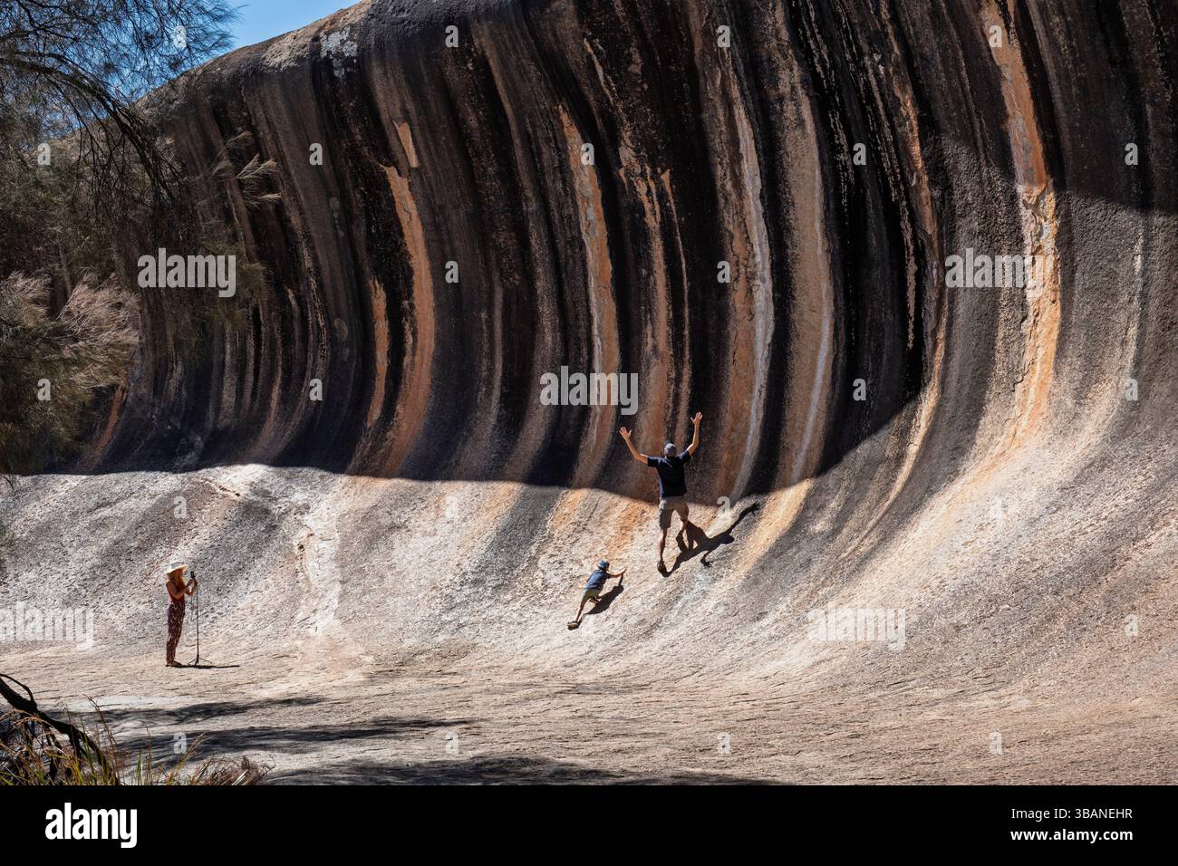 Tourists at Wave Rock, Hyden, Western Australia Stock Photo