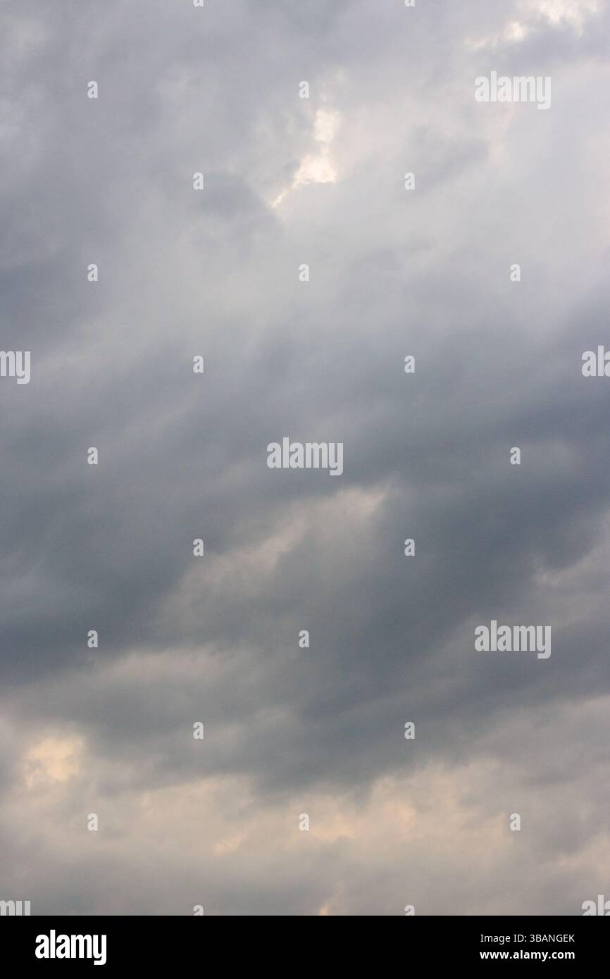 dark storm clouds on the sky. threatening atmosphere above horizon. scenic environment of disaster climate. bad weather air pressure Stock Photo