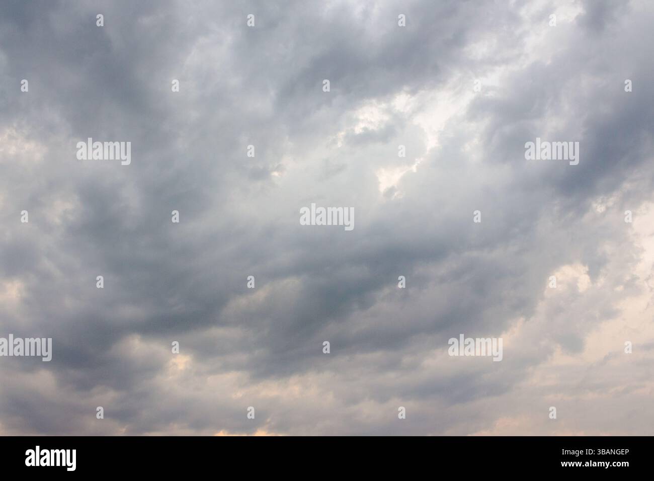 dark storm clouds on the sky. dramatic cloudy weather and meteorology background. scenic environment of disaster climate. heavy cumulonimbus pattern Stock Photo