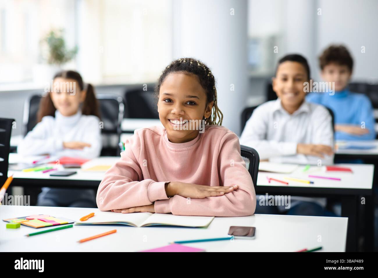 Elementary Education. Portrait of happy small african american girl ...