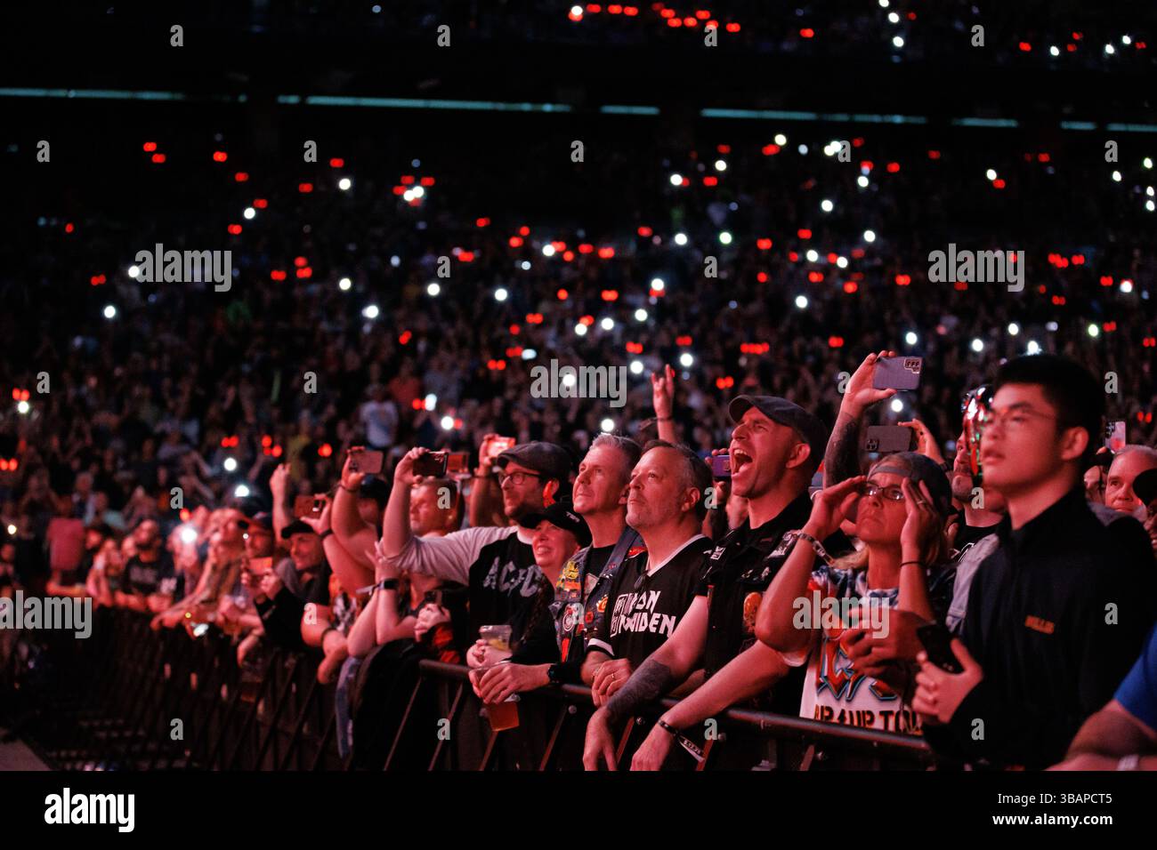 Landover, USA. 12th May, 2025. Fans cheer as AC/DC goes onstage at ...