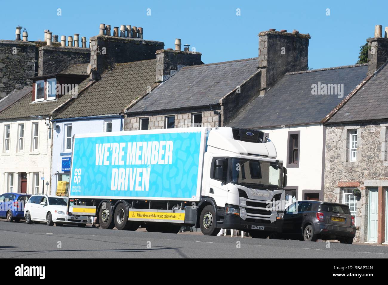 Co-Op supermarket delivery van deliverying to the small local Co Op store in Wigtown Scotland in May 2025 Stock Photo