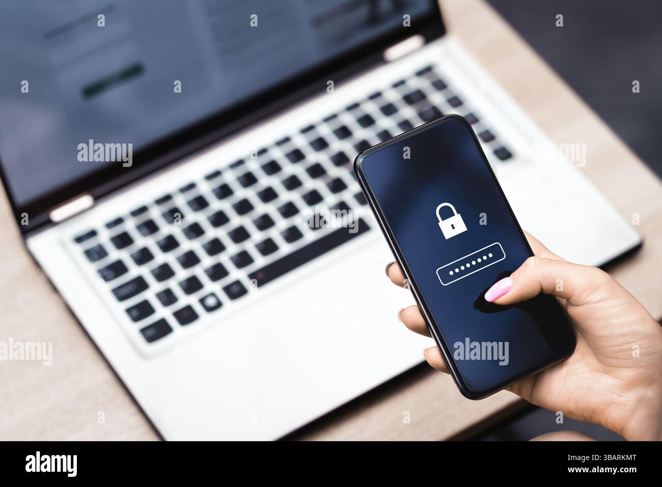 Password to protect data in phone. Cyber security against fraud and scam. Privacy lock online. Smartphone and laptop computer. Strong safety. Stock Photo